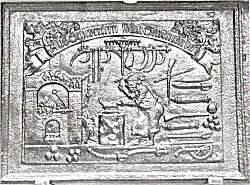 Ofenplatte mit handwerklichem Motiv